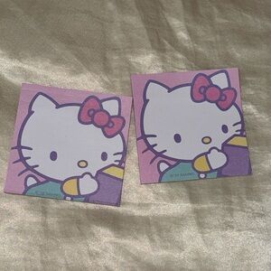 Two Hello Kitty sticky notes